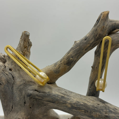 18K gold plated over 925 sterling silver stud style earrings.  Featuring a single 8.5mm Round White Freshwater pearl at the centre of the long hoop.  Overall earring length of 39mm.
