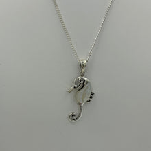 Load image into Gallery viewer, Sterling Silver Mother of Pearl inlay Seahorse pendant.  Price includes Base Metal chain.
