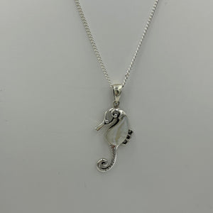 Sterling Silver Mother of Pearl inlay Seahorse pendant.  Price includes Base Metal chain.