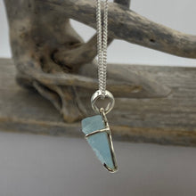 Load image into Gallery viewer, Sterling silver claw set pendant featuring stunning Rough cut Aquamarine gemstone

The stone varies in shape but are roughly rectangle and 15 x 20mm in size

Team with our aquamarine earrings for a WOW effect
