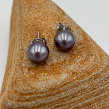 Load image into Gallery viewer, Exquisite natural dark lavender Edison pearls set in 9ct white gold stud settings.

These earrings featuring a pair of 9mm Round high quality pearls.&nbsp;
