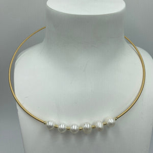 14ct gold plated over 925 sterling silver wire wrap necklace featuring 6 white drop shaped freshwater pearls, 7.5 x 9.5mm in size  The necklace is open ended and fits all neck sizes and has a single white 6mm freshwater pearl on either end 