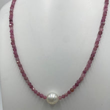 Load image into Gallery viewer, Australian South Sea pearl necklace with 3mm faceted ruby gemstones and a sterling silver peanut clasp  This stunning necklace features a single White Australian  South Sea pearl ,  Drop in shape,  9.5 x 10.5mm in size, and White with Silver hues in color  The overall length is 42cm  Good lustre and light natural &#39;birthmarks&#39;  J3336
