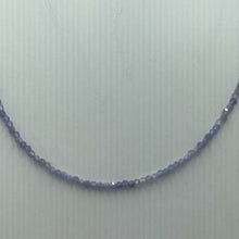 Load image into Gallery viewer, This stunning necklace features 2mm facetted blue Tanzanite gemstones, with a 925 sterling silver peanut clasp. It can be used as a necklace on it own or as a chain to hold a pendant.  It is on 49 strand high strength US wire with scrimps for security  Finished length is 45cm
