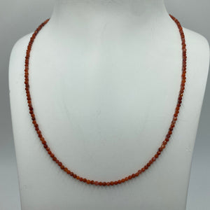 This stunning necklace features 2.5mm facetted Red Bamboo shape Coral beads , with a 925 sterling silver peanut clasp.  It can be used as a necklace on it own or as a chain to hold a pendant.  It is on 49 strand high strength US wire with scrimps for security  Finished length is 46cm