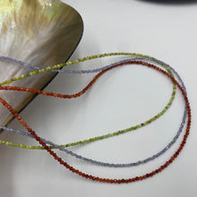 Load image into Gallery viewer, This stunning necklace features 2.5mm facetted Red Bamboo shape Coral beads , with a 925 sterling silver peanut clasp.  It can be used as a necklace on it own or as a chain to hold a pendant.  It is on 49 strand high strength US wire with scrimps for security  Finished length is 46cm
