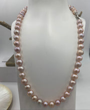 Load image into Gallery viewer, Freshwater pearl strand featuring shades of natural pink and lavender with high lustre.

This strand is 57cm long and the pearls are Round, 9-10.5mm in size with a stunning sterling silver clasp with a non tarnish finish
