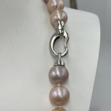 Load image into Gallery viewer, Freshwater pearl strand featuring shades of natural pink and lavender with high lustre.

This strand is 57cm long and the pearls are Round, 9-10.5mm in size with a stunning sterling silver clasp with a non tarnish finish
