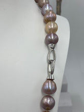 Load image into Gallery viewer, Large Freshwater pearl strand featuring shades of natural pink, lavender and white with average lustre.

This strand is 52cm long and the pearls are mixed shapes Off Round and Oval, 11-14.5mm in size with a non tarnish sterling silver clasp

SH513
