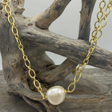 Load image into Gallery viewer, Gold chain necklace featuring an 13-14mm White Button smooth baroque shape freshwater pearl

This necklace is 18ct gold plated over 925 Sterling silver and features a lobster clasp

The length is adjustable up to 45cm by using the shorter links to attach the lobster clasp&nbsp;

There is a similar matching bracelet&nbsp; with the same name for $145

This is available in gold or silver&nbsp;
