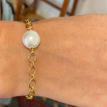 Load image into Gallery viewer, Gold chain bracelet featuring an 11.5mm White Button shape freshwater pearl  This bracelet is 18ct gold over 925 Sterling silver and features a lobster clasp  The length is adjustable by using the shorter links to attach the lobster clasp   There is a similar matching necklace with the same name for $195
