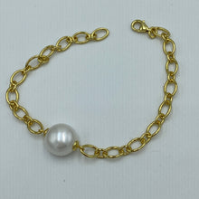 Load image into Gallery viewer, Gold chain bracelet featuring an 11.5mm White Button shape freshwater pearl  This bracelet is 18ct gold over 925 Sterling silver and features a lobster clasp  The length is adjustable by using the shorter links to attach the lobster clasp   There is a similar matching necklace with the same name for $195
