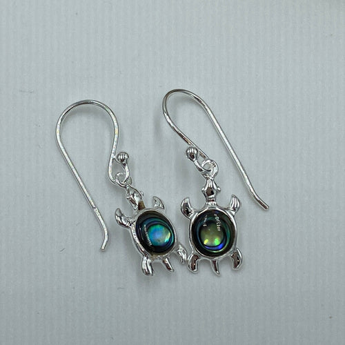 These cute Turtle earrings are a shepherds hook style and the turtle is inset with  Paua shell. They are 925 sterling silver   25mm from top of hook to base of Turtle  These are also available in Mother of Pearl inlay or also as studs