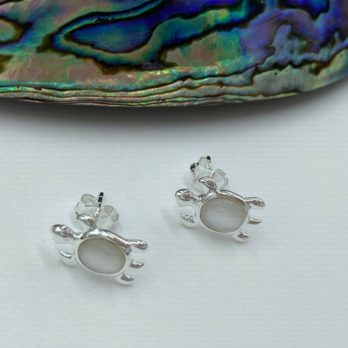 These cute Turtle earrings are a stud style and the turtle is inset with  Mother of Pearl shell. They are 925 sterling silver   15mm from top to base of Turtle  These are also available in Paua shell inlay or also as hook style