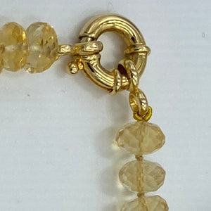 <p>Citrine bracelet featuring a white Australian South Sea Pearl</p> <p>Pearl is a button shape, and is 11.8mm in size and is white with silver pink hues in colour</p> <p>The Citrine beads are facetted button shaped and are 8.5 x 3.5mm in size</p> <p>This bracelet is knotted with a gold plated over sterling silver bolt ring clasp</p> <p>J3362</p>
