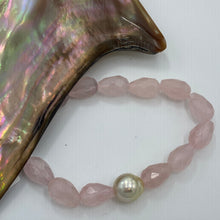 Load image into Gallery viewer, &lt;p&gt;Beautiful Rose Quartz bracelet featuring a Golden South Sea Pearl&lt;/p&gt; &lt;p&gt;Pearl is circle drop in shape, and is 10.3 x 11.7mm in size and golden in colour&lt;/p&gt; &lt;p&gt;The Rose Quartz beads are facetted briolette cut and are 8 x 12.5mm in size&lt;/p&gt; &lt;p&gt;This bracelet is easy to wear as it&#39;s made on elastic&lt;/p&gt; &lt;p&gt;J3359&lt;/p&gt;
