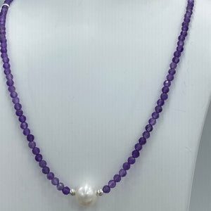 <p><span>This necklace features a white Freshwater Pearl&nbsp; on a necklace of 3.5mm facetted Amethyst gemstones with a sterling silver peanut clasp</span></p> <p><span>The pearl is 9.5 x 10.5mm in size</span></p> <p>The overall length is 44cm</p> <p>Other gemstone necklaces can be made to order</p>