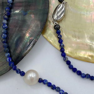 <p><span>This necklace features a white Freshwater Pearl&nbsp; on a necklace of 3.5mm facetted Lapis gemstones with a sterling silver peanut clasp</span></p> <p><span>The pearl is 9.5 x 10.5mm in size</span></p> <p>The overall length is 43cm</p> <p>Other gemstone necklaces can be made to order</p>