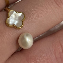 Load image into Gallery viewer, This stunning ring is adjustable in size and features white Mother of Pearls shell in the shape of a four leaf clover   It is 14k gold plated over 925 Sterling silver ring  AK
