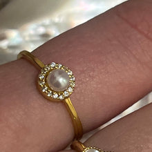 Load image into Gallery viewer, This elegant and feminine  ring features a single white round 4mm freshwater pearl   It is 14k gold plated over 925 Sterling silver ring  Sizes available to select from 
