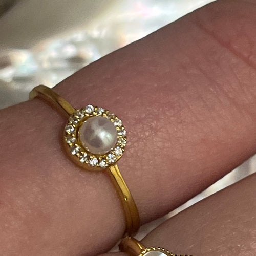 This elegant and feminine  ring features a single white round 4mm freshwater pearl   It is 14k gold plated over 925 Sterling silver ring  Sizes available to select from 