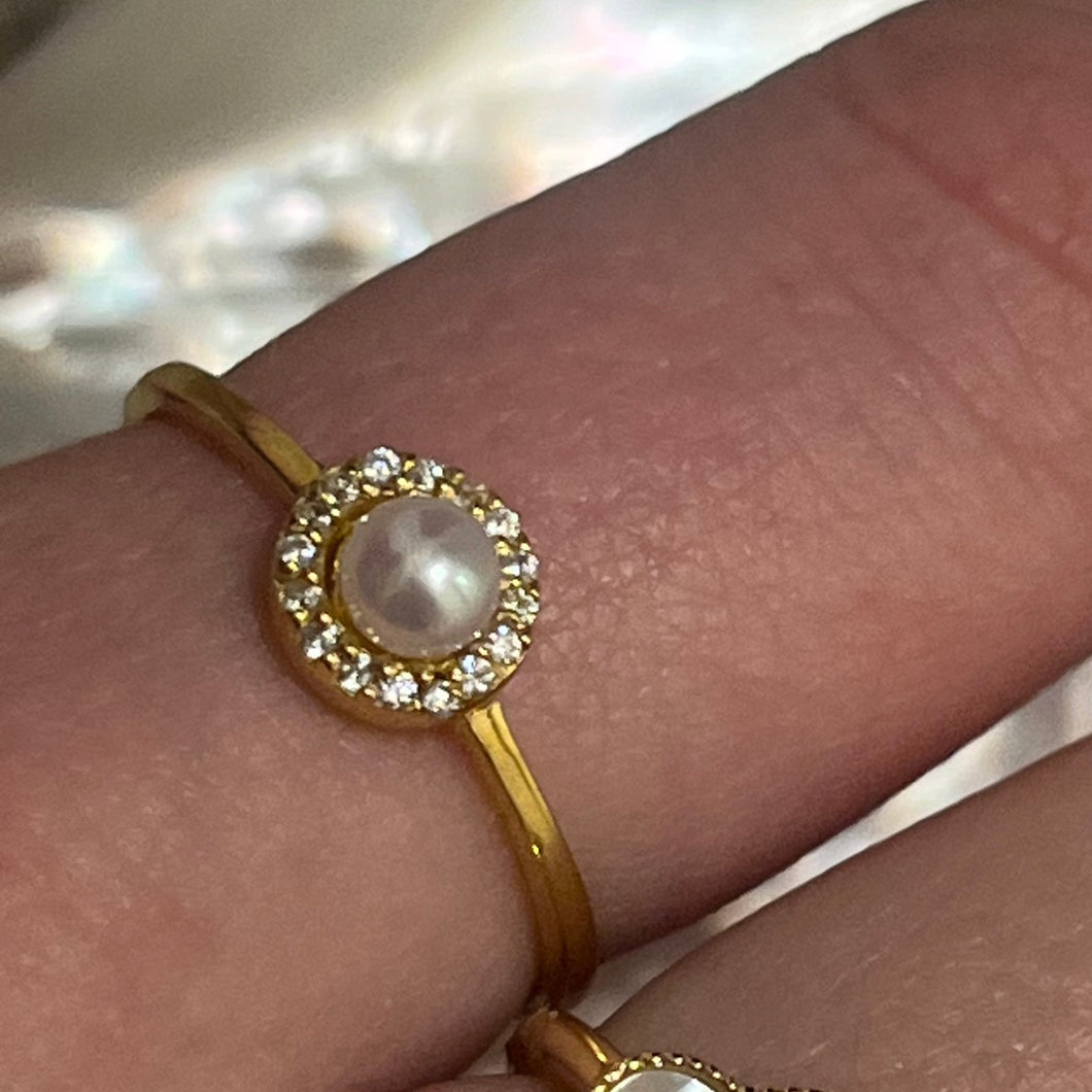 This elegant and feminine  ring features a single white round 4mm freshwater pearl   It is 14k gold plated over 925 Sterling silver ring  Sizes available to select from 
