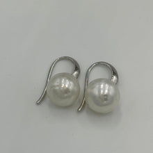 Load image into Gallery viewer, Australian South sea pearl earrings on&nbsp;925 sterling silver &#39;knife edged&#39; hooks.  They feature circle button pearls, 10.7mm in size and White in color.  J3252
