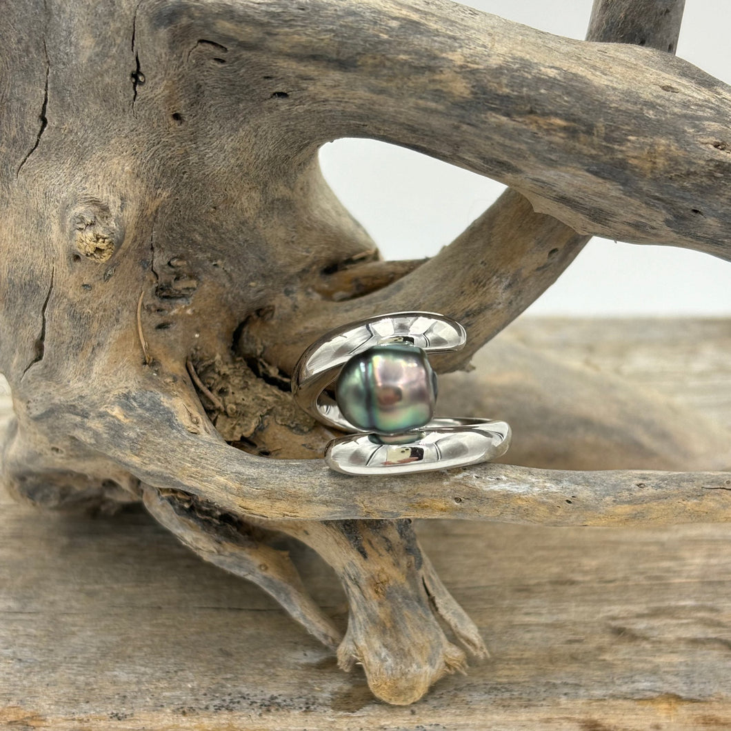 Sterling silver and rhodium coated for a non tarnish finish, this ring featuring an 11.1mm,  Semi Round  Fijian pearl , the color is an unusual Gold  with striking green hues.   Size 58  J3431