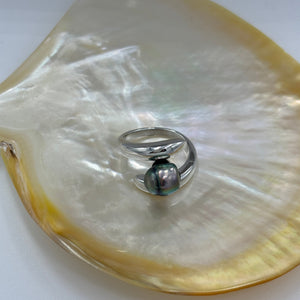 Sterling silver and rhodium coated for a non tarnish finish, this ring featuring an 11.1mm,&nbsp; Semi Round&nbsp; Fijian pearl , the color is an unusual Gold&nbsp; with striking green hues.&nbsp;  Size 58  J3431