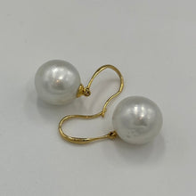 Load image into Gallery viewer, Australian South sea pearl earrings on 9ct Yellow gold shepherd hooks.&nbsp;  They feature Baroque Drop shaped pearls,&nbsp; 12mm x 13mm in size and White with Silver hues in color.  J3476 (INS)
