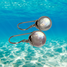 Load image into Gallery viewer, Sterling Silver Shepherds Hook featuring a 10-11mm Coin Freshwater Pearl, White in Colour with Silver-Pink Hues.
