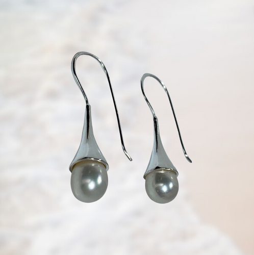 Sterling silver hook earrings featuring Freshwater pearls, Drop shape, 7mm and White in color  Also available in rose gold 