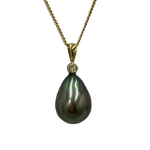 Load image into Gallery viewer, Our &#39;Lucia&#39; pendant is 9ct Yellow Gold and diamond with a stunning Drop shaped Tahitian South Sea Pearl.  It features a single bezel set diamond of 0.035ct and HSI quality   The pearl is tear drop in shape and 11.8 x 16.5mm in size and is a stunning Peacock Green in color with strong Aubergine hues and High lustre  J3194
