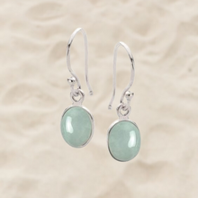 Load image into Gallery viewer, &lt;p&gt;Sterling silver claw set shepherds hook style earrings featuring stunning facetted bezel set Oval shape Aquamarine gemstones&lt;/p&gt; &lt;p&gt;Team your aquamarine earrings with an aquamarine necklace for a WOW effect&lt;/p&gt;
