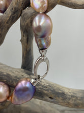 Load image into Gallery viewer, Stunning Freshwater pearl bracelet featuring Eight High lustre natural color Baroque pearls, stunning natural lavender, pink, apricot and Gold tones in colour and 14-25mm in size.

Fully knotted with a 925 sterling silver clasp (non tarnish finish).

Length overall is 21cm
