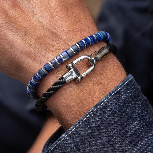 Stunning new range of Unisex Stainless steel and nautical rope jewellery, hand made in Amsterdam and designed with strength to be worn 24/7

Blue Lapis and Grey 4mm semi precious stones with a 4mm Silver slider 

Adjustable size

In stock now size M

Also available in other colors and sizes 