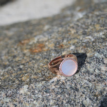 Load image into Gallery viewer, We named this ring Glow because the nacre of the Mother of Pearl inlay in this ring literally glows in the daylight and the moonlight   It is Rose gold plated over Sterling Silver and measures 12mm across the top  This stunning ring is adjustable in size so one size fits all
