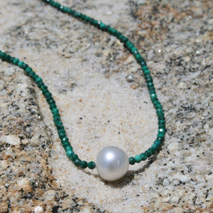 Australian South Sea pearl necklace with malachite faceted gemstones and a sterling silver peanut clasp  This stunning necklace features an Australian South Sea pearl , Circle Drop in shape, and 10.9mm in size. It is  white with Subtle  Pink hues in color  The overall length is 45cm  Good lustre and light natural 'birthmarks'  J3324