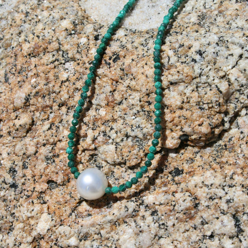 Australian South Sea pearl necklace with malachite faceted gemstones and a sterling silver peanut clasp  This stunning necklace features an Australian South Sea pearl , Circle Drop in shape, and 10.9mm in size. It is  white with Subtle  Pink hues in color  The overall length is 45cm  Good lustre and light natural 'birthmarks'  J3324