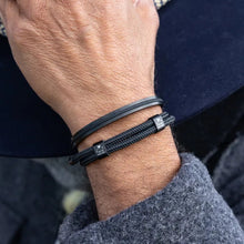 Load image into Gallery viewer, Stunning new range of Men&#39;s Stainless steel and nautical rope jewellery, hand made in Amsterdam and designed with strength to be worn 24/7

Black 6mm round rope and matt black fittings

Adjustable size

In stock now in size L

Also available in other colors and sizes&nbsp;
