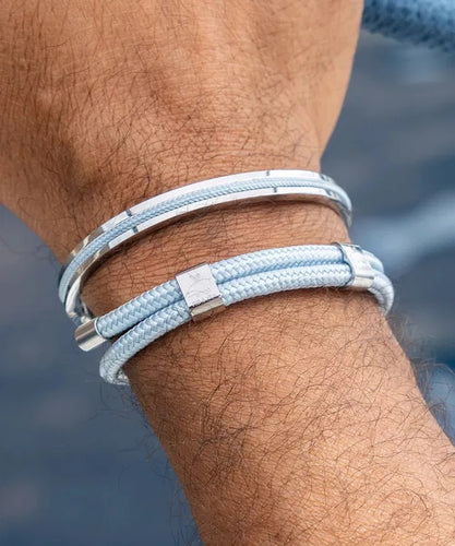 Stunning new range of Men's Stainless steel and nautical rope jewellery, hand made in Amsterdam and designed with strength to be worn 24/7

Silver  6mm cuff with 2mm flat blue rope

In stock now size S/M

Pictured below with 'Little Lewis