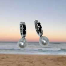 Load image into Gallery viewer, Sterling Silver &#39;Huggie&#39; Earrings featuring Drop Shape White 7.5-8mm Pearls.  Also available in Black Pearls.
