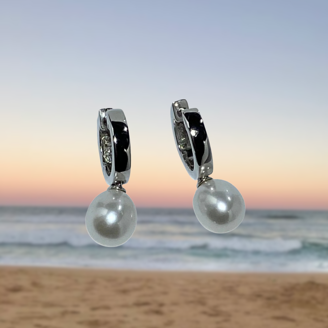 Sterling Silver 'Huggie' Earrings featuring Drop Shape White 7.5-8mm Pearls.  Also available in Black Pearls.