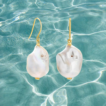 Load image into Gallery viewer, Sterling silver or gold plated shepherds hook earrings  Featuring White Freshwater Baroque pearls iwa pearl 18 -25mm   Overall earring length of 19 x 40mm  Also available in 18k gold plated   SKU GZ00042
