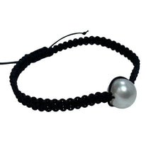 Load image into Gallery viewer, Thin Black Macrame bracelet featuring an Australian South Sea Pearl, Button shape, 11.3mm in size, White with Pink hues.  (J2876)  This bracelet is made from water and colorfast nylon material for heavy duty wear and tear, features no glue and no metal parts
