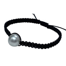 Load image into Gallery viewer, Thin Black Macrame bracelet featuring an Australian South Sea Pearl, Button shape, 11.3mm in size, White with Pink hues.  (J2876)  This bracelet is made from water and colorfast nylon material for heavy duty wear and tear, features no glue and no metal parts
