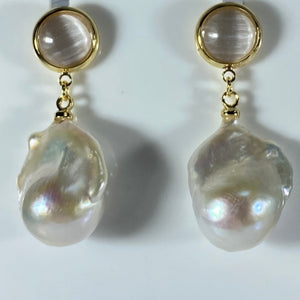 14ct yellow gold plated over Sterling silver Drop style earrings with stud post featuring "Cats Eye" stones at top with large 14 -16mm Baroque shape Freshwater pearl, White in color