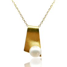 Load image into Gallery viewer, 18K gold plated over 925 sterling silver pendant and chain  Satin finish pendant with and has a Button shape white  Freshwater pearl 8.5-9mm  Pendant is 25mm from top to bottom in height  Matching earrings available named &#39;By The Sea&#39; earrings
