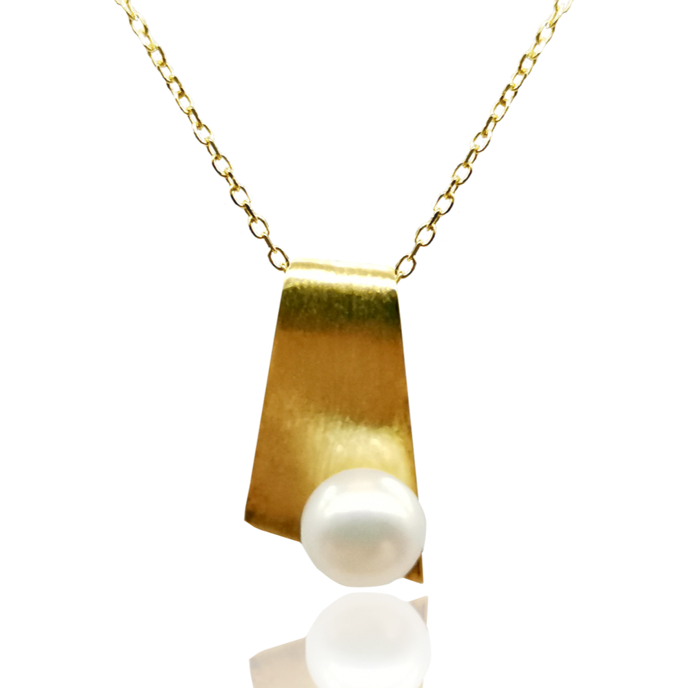 18K gold plated over 925 sterling silver pendant and chain  Satin finish pendant with and has a Button shape white  Freshwater pearl 8.5-9mm  Pendant is 25mm from top to bottom in height  Matching earrings available named 'By The Sea' earrings