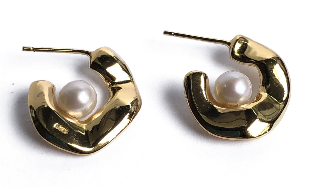 18K gold plated over 925 sterling silver stud style earrings  Polish finish studs with Round shaped Freshwater pearls 6-6.5mm  Overall earring length of 20mm.  Matching pendant available named 'Cloud' pendant 